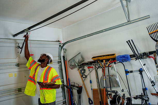 Professional Garage Door Roller Replacement technician working in El Valle de Arroyo Seco, NM